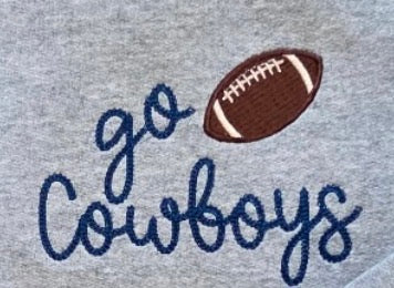 Gray fabric with 'go Cowboys' embroidered text and football design